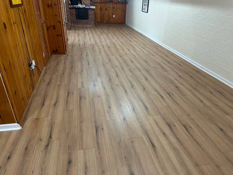 Newly installed water-resistant laminate flooring designed for wheelchair accessibility